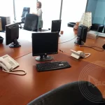 Desktops and keyboards relocated and set up in a new office