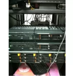 A computer server with a keyboard on the rack