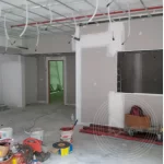 An office under renovation with equipment and tools