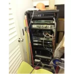 A rack and housing in a server room