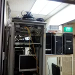Computer hardware and cables stored in the room