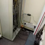 A server rack with messy wires and cables