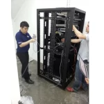 IT technician setting up a small server room